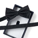 Noeud papillon noir à pois blancs