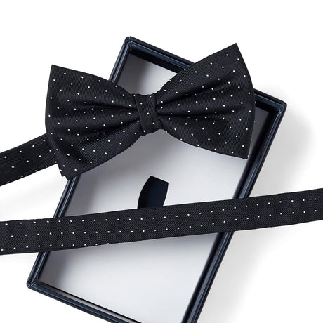 Noeud papillon noir à pois blancs